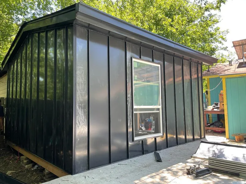 Black standing seam metal wall panels for Roof Inspection in Pendleton